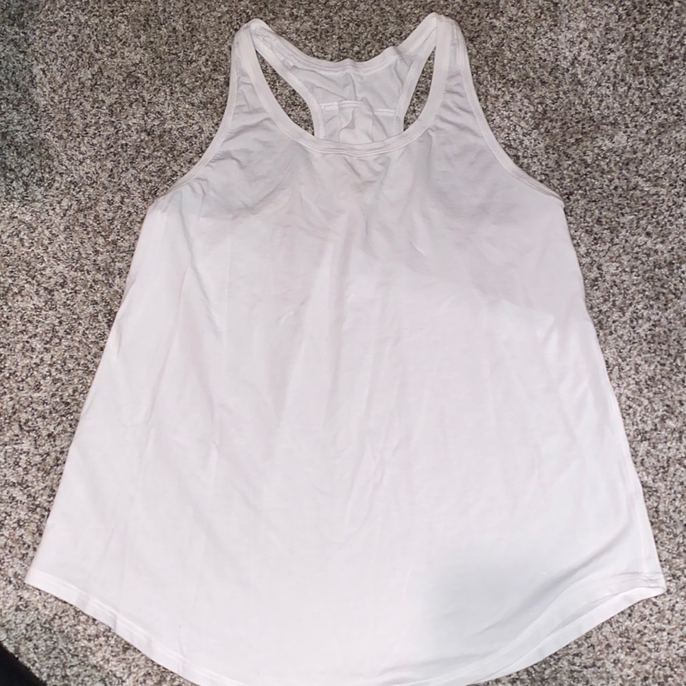white loose fitting lululemon tank top